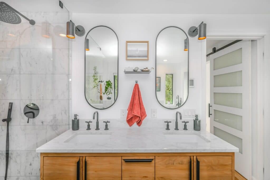 Should Bathroom Mirror Touch Backsplash?