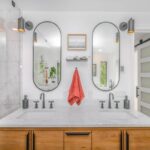 Should Bathroom Mirror Touch Backsplash?