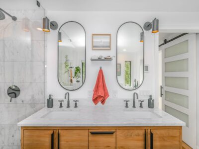 Should Bathroom Mirror Touch Backsplash?