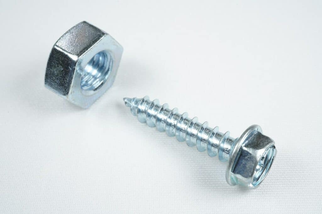 Where does the washer go on a screw?