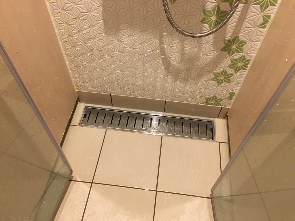 Cement-Like Stuff In Shower Drain